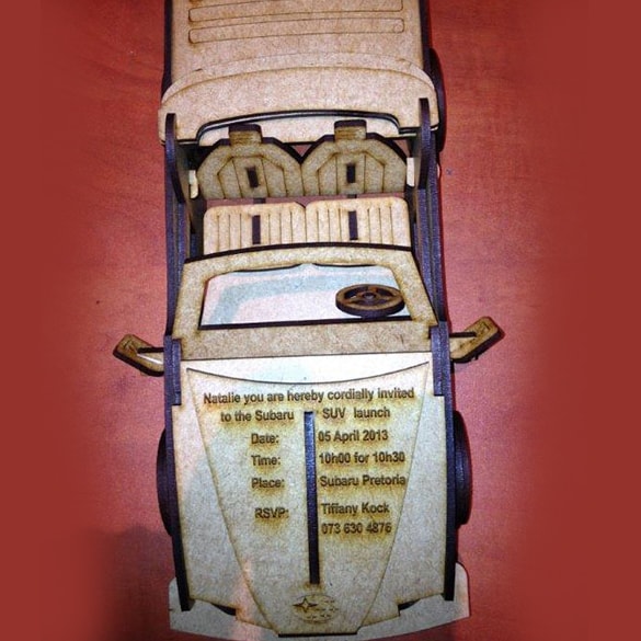 wooden car model with invite